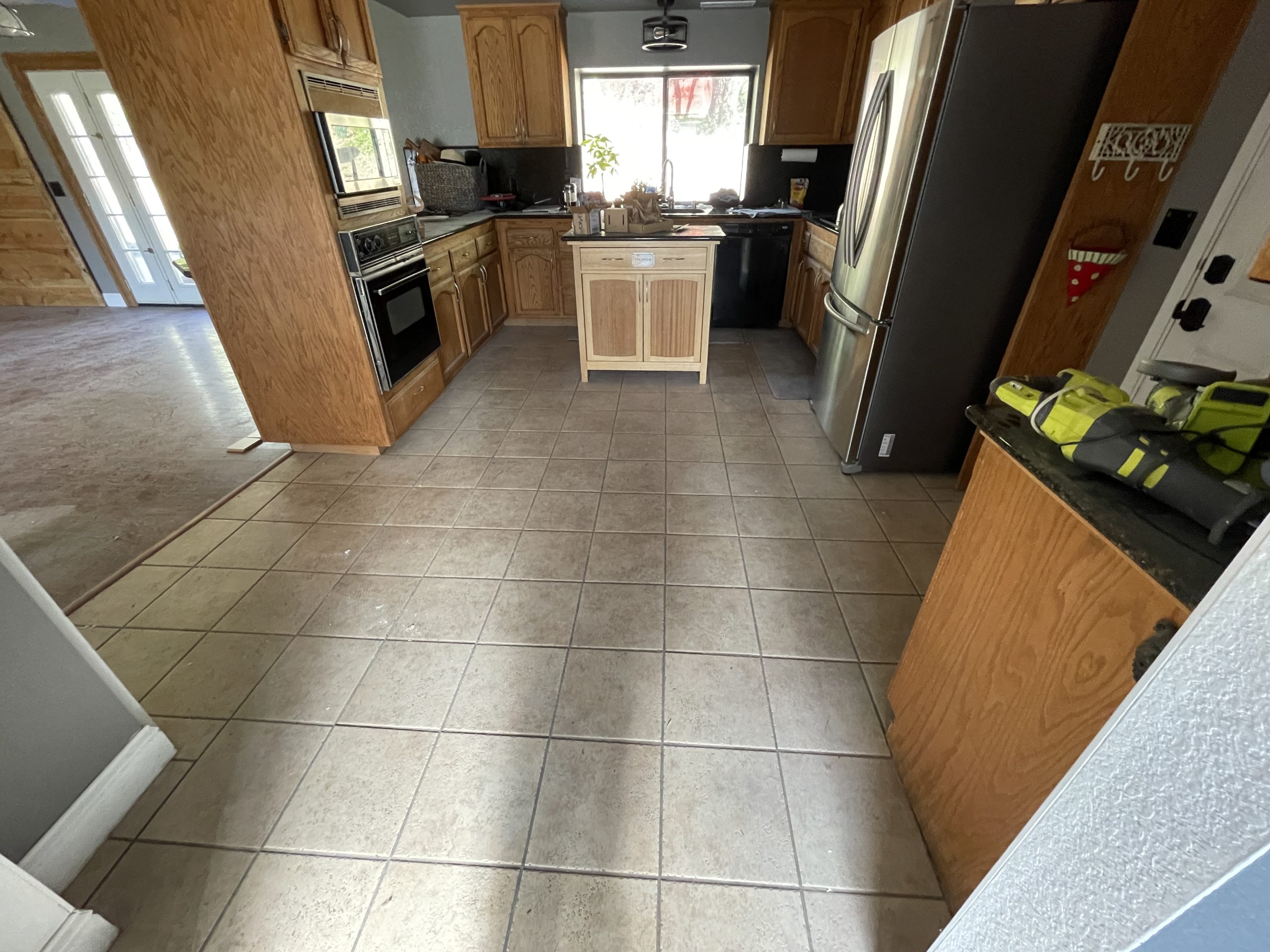 Home's kitchen floor tiles installed