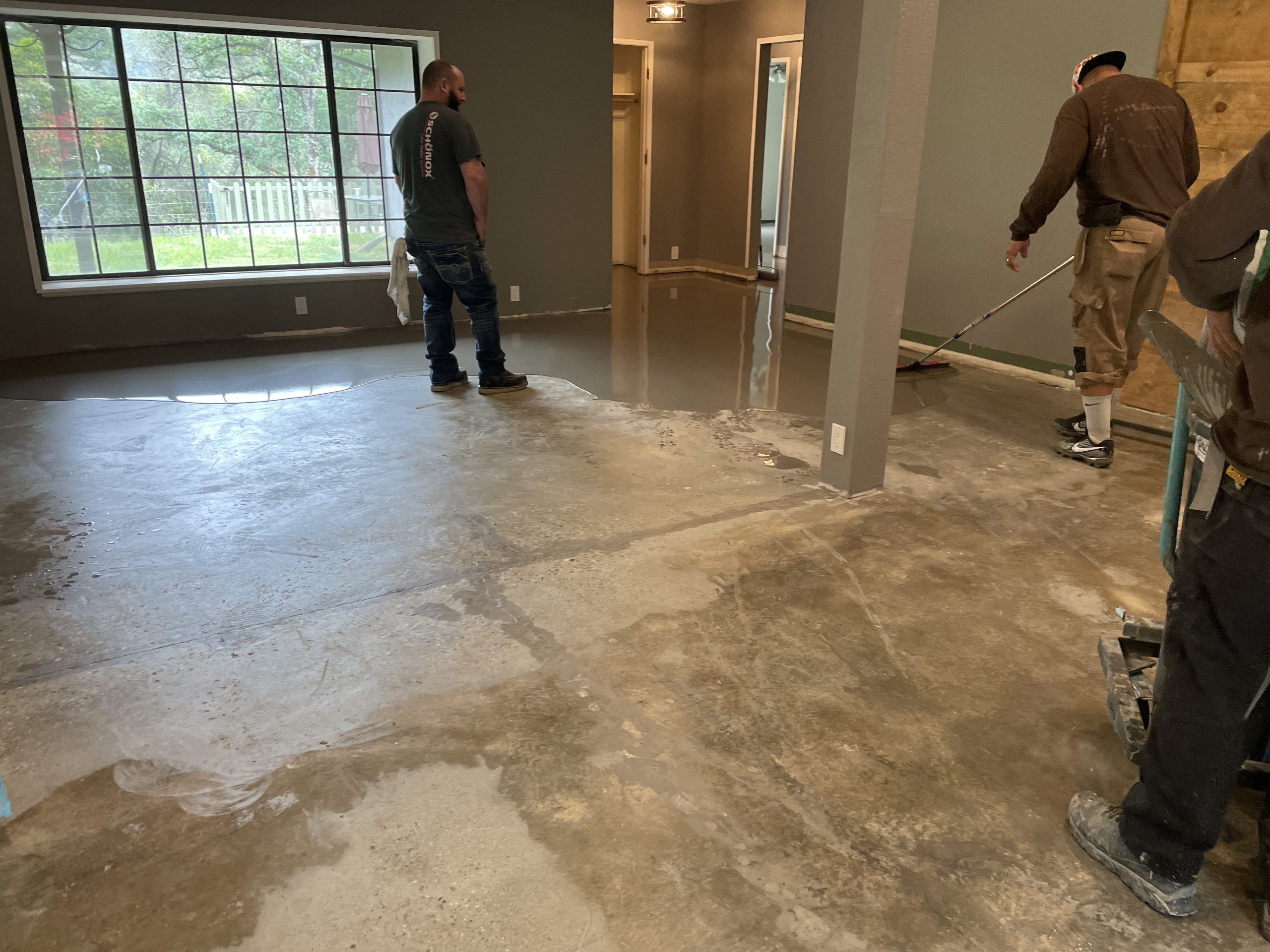 Employees preparing home's custom floor design